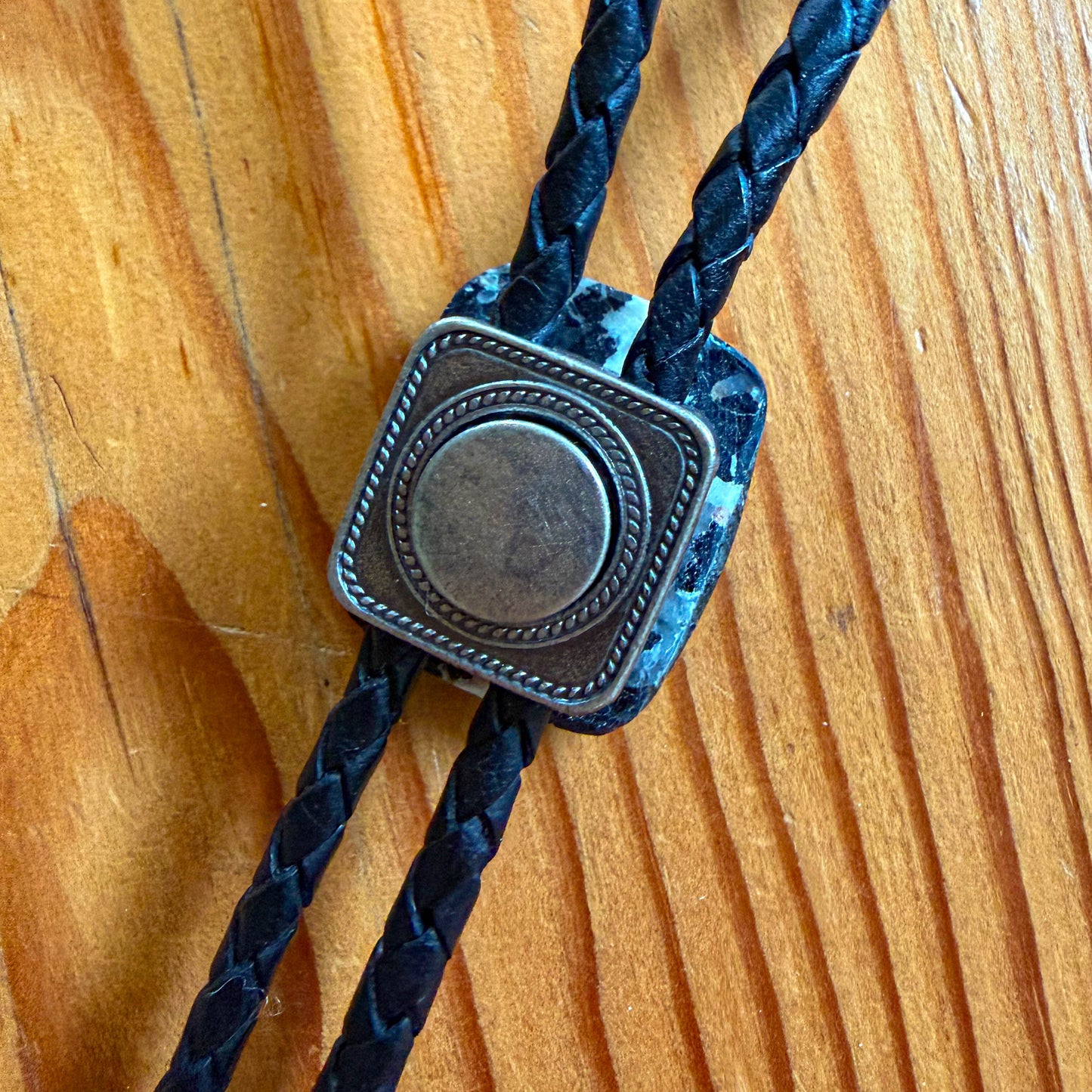 Buffalo Turquoise Bolo Tie - Black Braided Leather Cord, Antique Silver SUN Tips